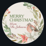 Pegatina Redonda Nombre Personalizado Morerry Christmas Watercolor<br><div class="desc">hermosa base de textura de marfil acuarela con una corona de color de agua de verduras, ramas, bayas profundas y poinsettias rojas y blancas, con un precioso amigo volador echado sobre los florales. Ambas áreas de texto son personalizable. primero dice feliz navidad, enviar incluye una letra de guión para la...</div>