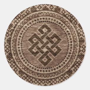 Pegatina Redonda Nudo sin fin decorativo en superficie de madera