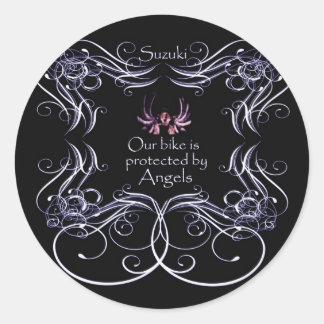 Pegatina Redonda Nuestra bicicleta está protegida por los ángeles
