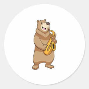 Pegatina Redonda Oso como músico con saxofón