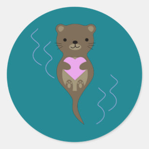 Pegatina Redonda Otter lindo abrazando un corazón rosado