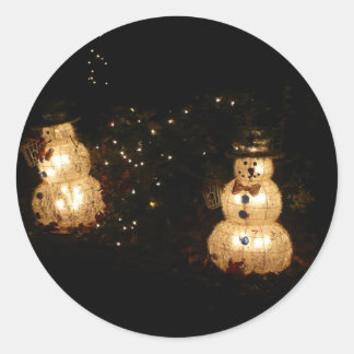 Pegatina Redonda Pantalla de luz de vacaciones de Snowman