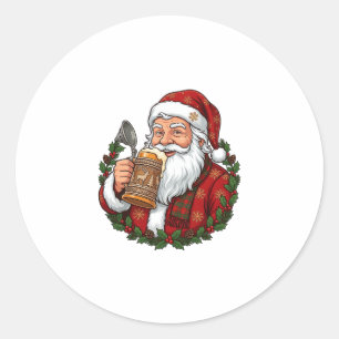Pegatina Redonda Papá Noel de Navidad sosteniendo un vaso de cervez
