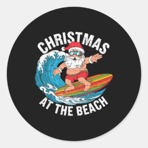 Pegatina Redonda Papá Noel divertido surfeando Navidad en julio Xma