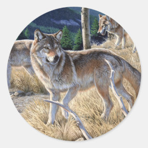 Pegatina Redonda Paquete de lobos en la pintura forestal