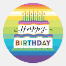 Pastel de cumpleaños de color brillante con velas