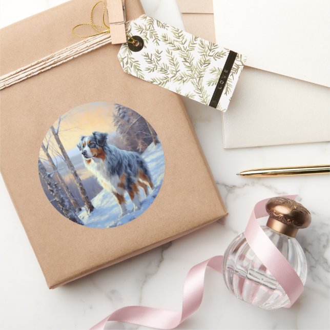 Pegatina Redonda Pastor australiano deja que nieva a Navidades (Regalar)