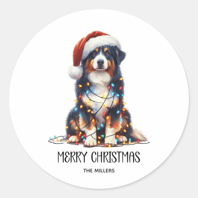 Pegatina Redonda Pastor australiano envuelto en luz de Navidades (Anverso)