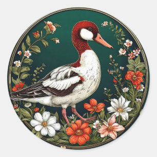 Pegatina Redonda Pato elegante rodeado de flores vibrantes