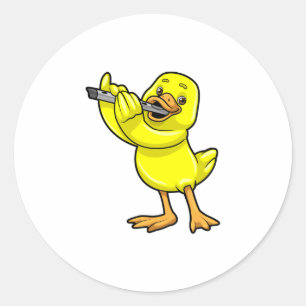 Pegatina Redonda Pato en la música con flauta
