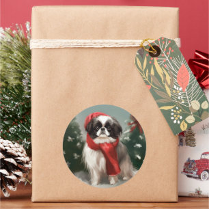 Pegatina Redonda Perro Chin Japonés en Navidad con Nieve