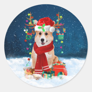 Pegatina Redonda Perro Corgi en Nieve con regalos de Navidades