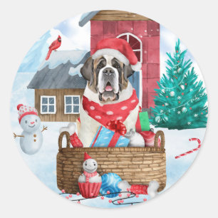 Pegatina Redonda Perro de San Bernardo en casa de perros de Navidad