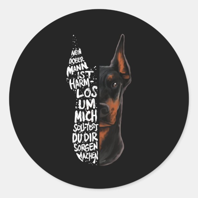 Pegatina Redonda Perro Doberman dice regalo inofensivo (Anverso)