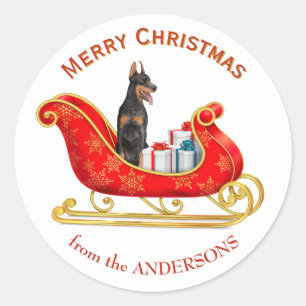 Pegatina Redonda Perro Doberman Pinscher de Trineo de Navidad