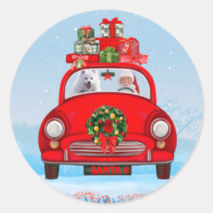 Pegatina Redonda Perro esquimal americano en coche con Papá Noel