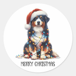 Pegatina Redonda Perro pastor australiano envuelto en luz de Navida