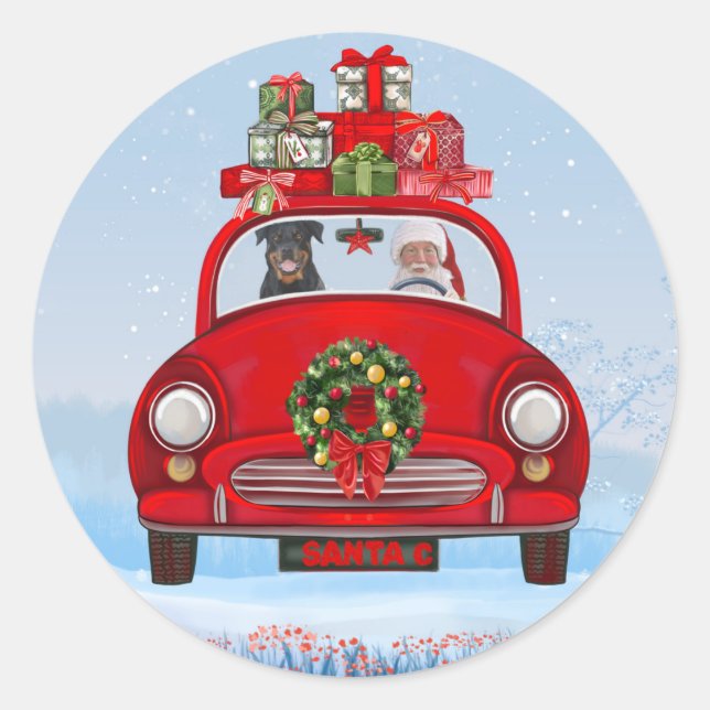 Pegatina Redonda Perro Rottweiler En Coche Con Santa Claus (Anverso)