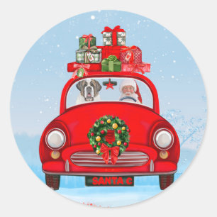 Pegatina Redonda Perro San Bernardo en coche con Papá Noel