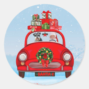 Pegatina Redonda Perro Schnauzer en coche con Papá Noel