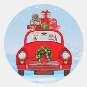 Pegatina Redonda Perro Shiba Inu en coche con Papá Noel 