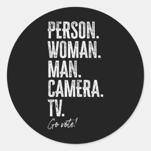 Pegatina Redonda Persona. Mujer. Hombre. Cámara. Tv. Vota Anti Trum