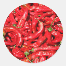 Pegatina Redonda Pimientos de pollo calientes rojos al aire libre e