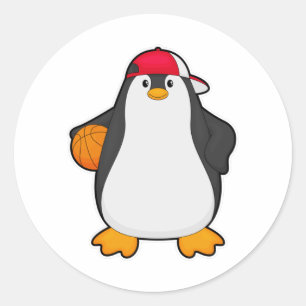 Pegatina Redonda Pingüino como jugador de baloncesto con baloncesto