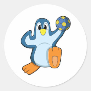 Pegatina Redonda Pingüino como jugador de balonmano con balonmano
