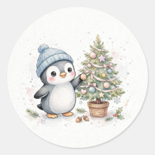 Pegatina Redonda Pingüino decorando árbol de Navidad