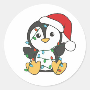 Pegatina Redonda Pingüinos Navidades de pingüino en invierno