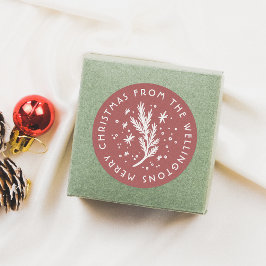 Pegatina Redonda Pino y nieve de la mano rojo Feliz Navidad