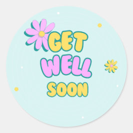 Pegatina Redonda Ponte bien pronto el texto en negrita con flores e