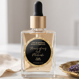 Pegatina Redonda Producto de cosméticos con brillo negro y dorado d