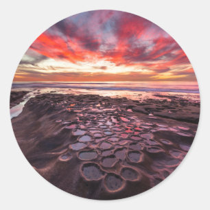 Pegatina Redonda Puesta de sol asombrosa en las piscinas de marea