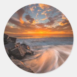 Pegatina Redonda Puesta de sol desde la playa de Tamarach