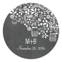 ramas de árboles florales y jarras de albañil