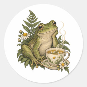 Pegatina Redonda Rana Acogedora con Té de Manzanilla y Helechos