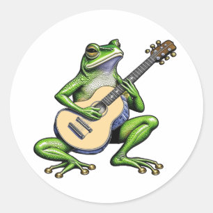 Pegatina Redonda Rana divertida tocando guitarra