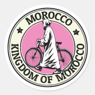 Pegatina Redonda Reino de Marruecos Jinete de bicicleta en la playa