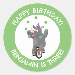 Pegatina Redonda Rinoceronte gracioso en unicycle en cumpleaños per