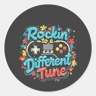 Pegatina Redonda Roca a un autismo diferente de la almohadilla de j