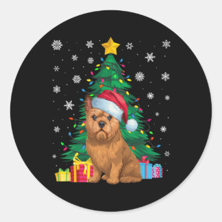 Pegatina Redonda Ruidosos árboles de navidad iluminan garrapatas de