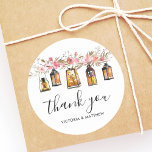 Pegatina Redonda Rústica acuarela Floral Boda Gracias<br><div class="desc">Este Boda Gracias Pegatina presenta lámparas de color acuático rústico,  velas y flores rosas. Para una personalización más avanzada de este diseño,  pulse el botón "Personalizar". También están disponibles los elementos coincidentes.</div>