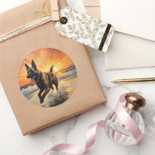 Pegatina Redonda Sandy Paws con perro malinés belga en la puesta de