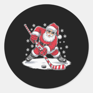 Pegatina Redonda Santa divertido de Navidad jugando hockey sobre hi
