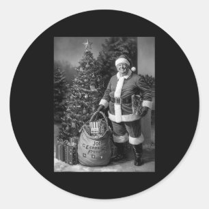 Pegatina Redonda Santa Trump con un saco lleno de regalos Navidad