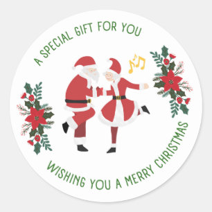 Pegatina Redonda Santa y la Sra. Claus bailan el sticker navideño
