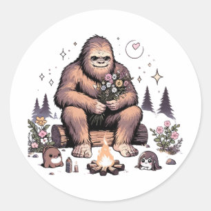 Pegatina Redonda Sasquatch sosteniendo flores