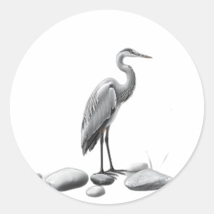 Pegatina Redonda Serene Heron entre piedras